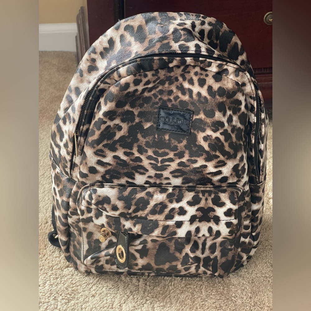 Coach backpack medium size.